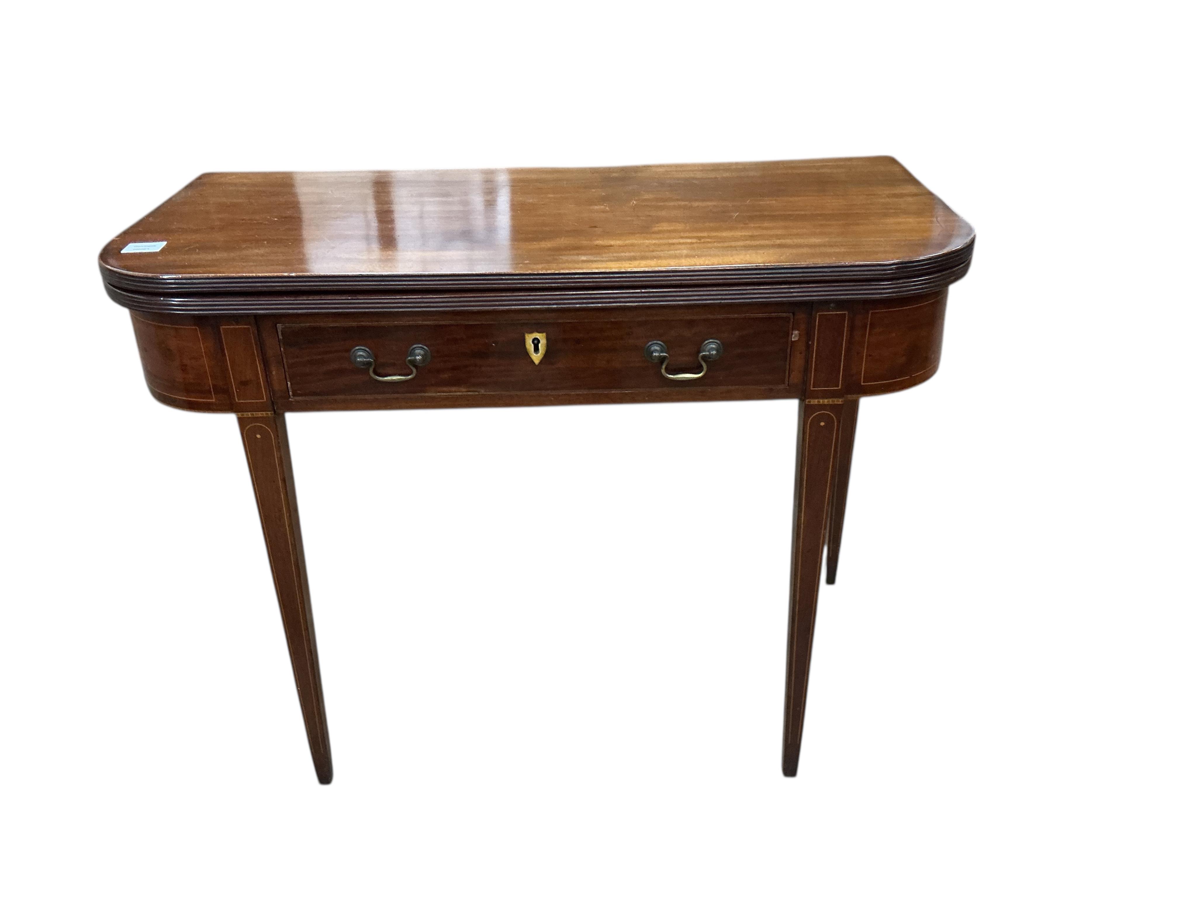 A George III mahogany D shaped folding tea table, width 97cm, depth 46cm, height 75cm